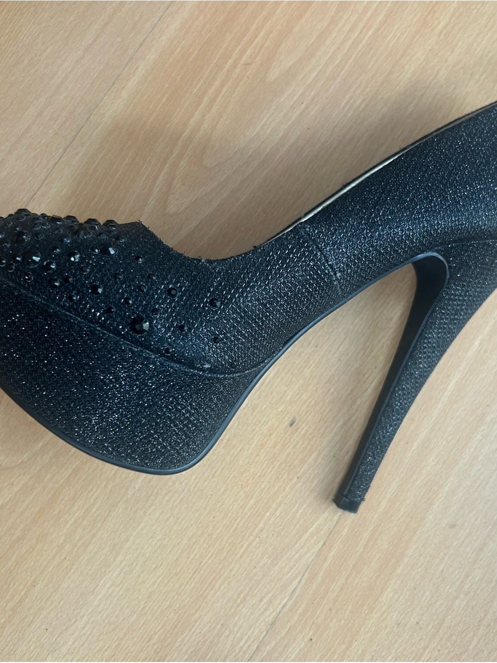 6.5 black stiletto featuring a glittery finish rhinestone studded platform
